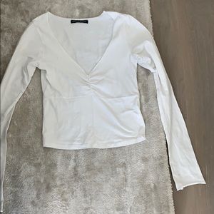 White brandy Melville long sleeve crop top.